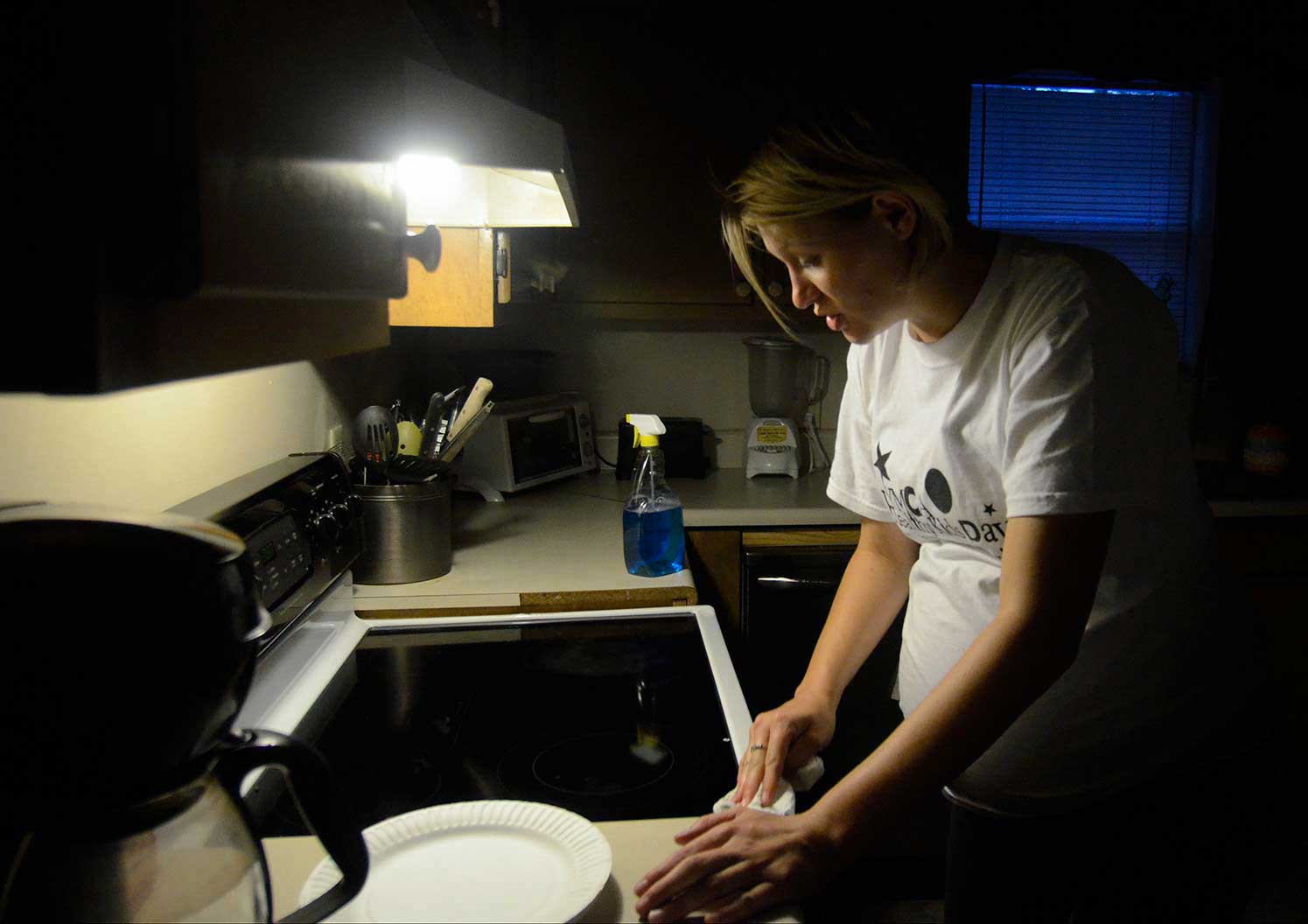 Stephanie does her chores at the Carter Hope Center.