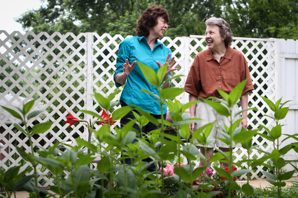 The Hastings sisters in their garden.