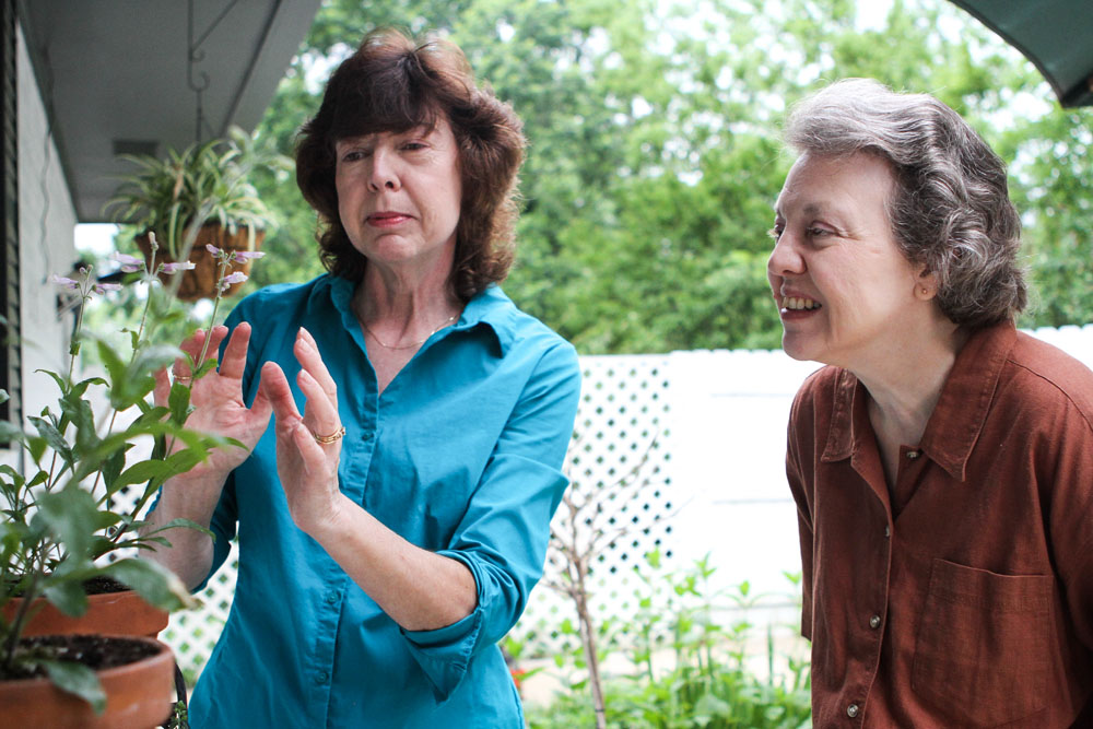 The Hastings sisters in their garden.